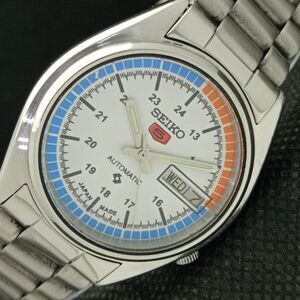 Seiko Silver Watch with Blue and Orange Accents